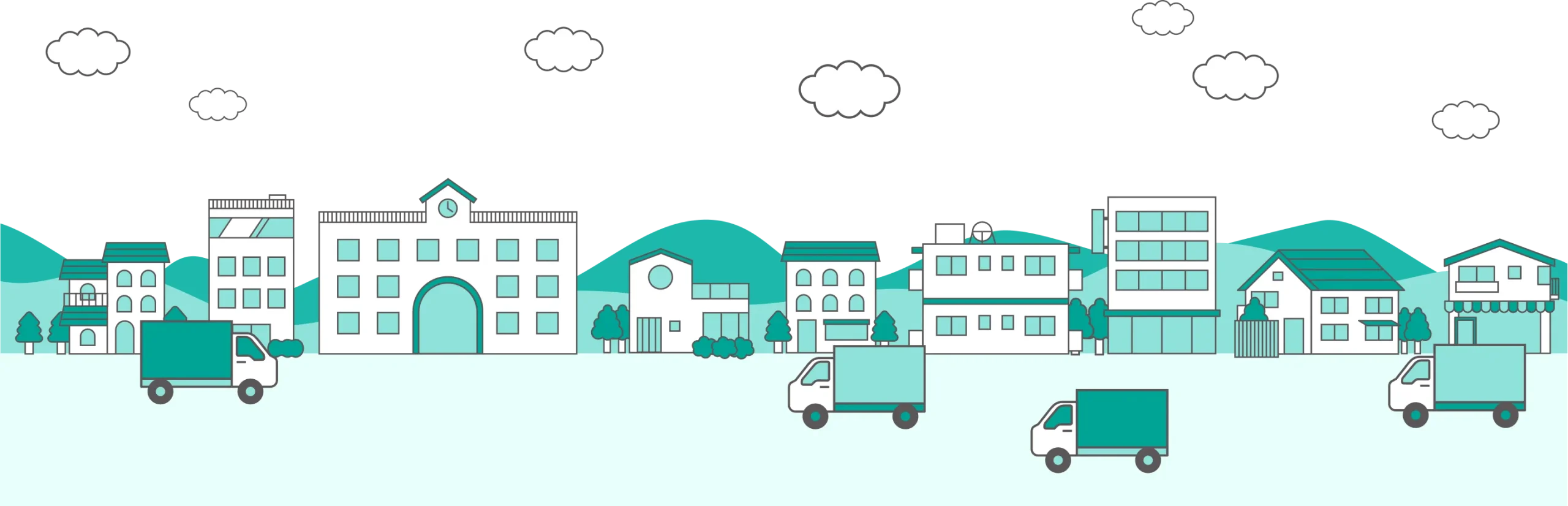 街並みにトラックが走る穏やかな町の風景